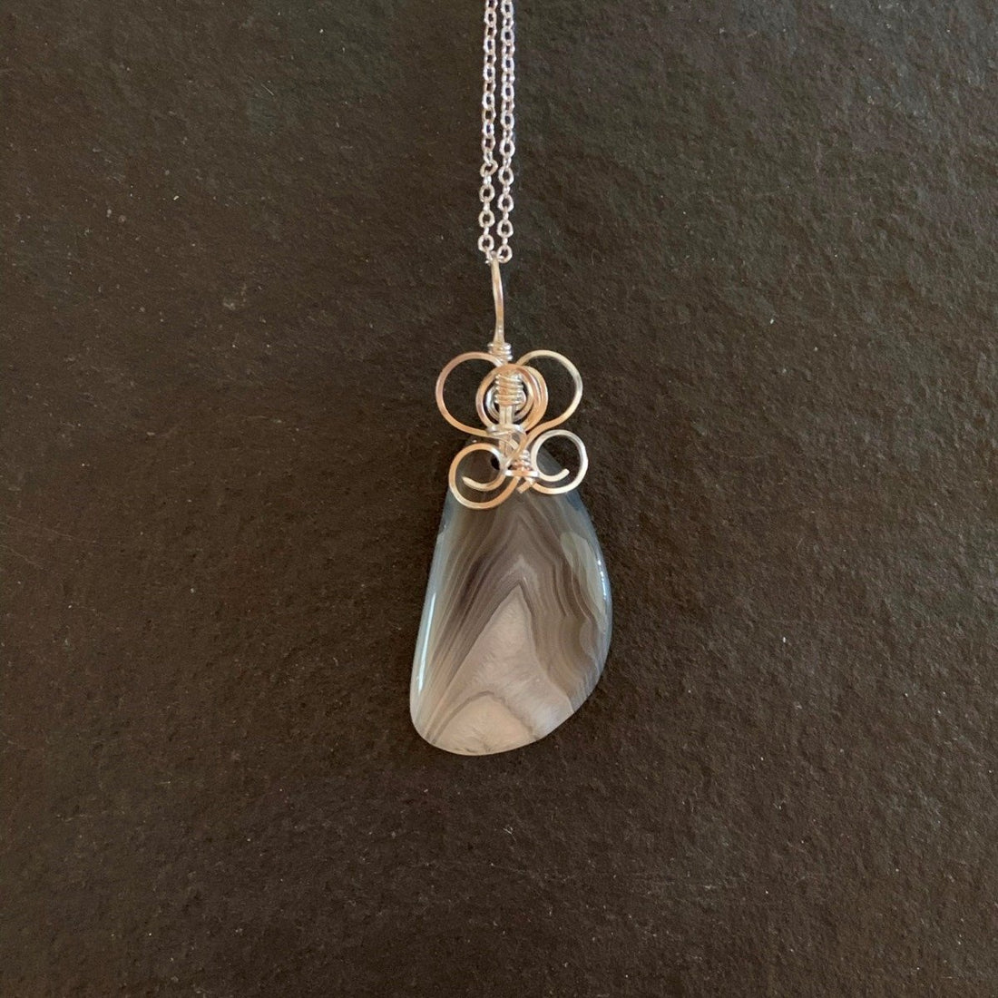 Pendant made of Grey Botswana Agate w/silver wrap; 1: x 2.58" incl bail