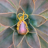 Pendant made of Purple Chalcedony free form with gold wire 1" w x 2 3/8" h incl bail