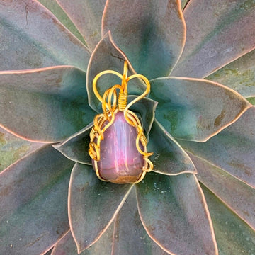 Pendant made of Purple Chalcedony free form with gold wire 1" w x 2 3/8" h incl bail