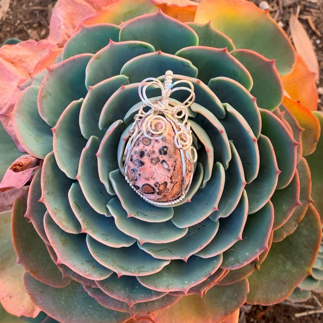 Pendant made of Leopard Skin Jasper nugget with silver wrap; 1" w x 2" H incl bail