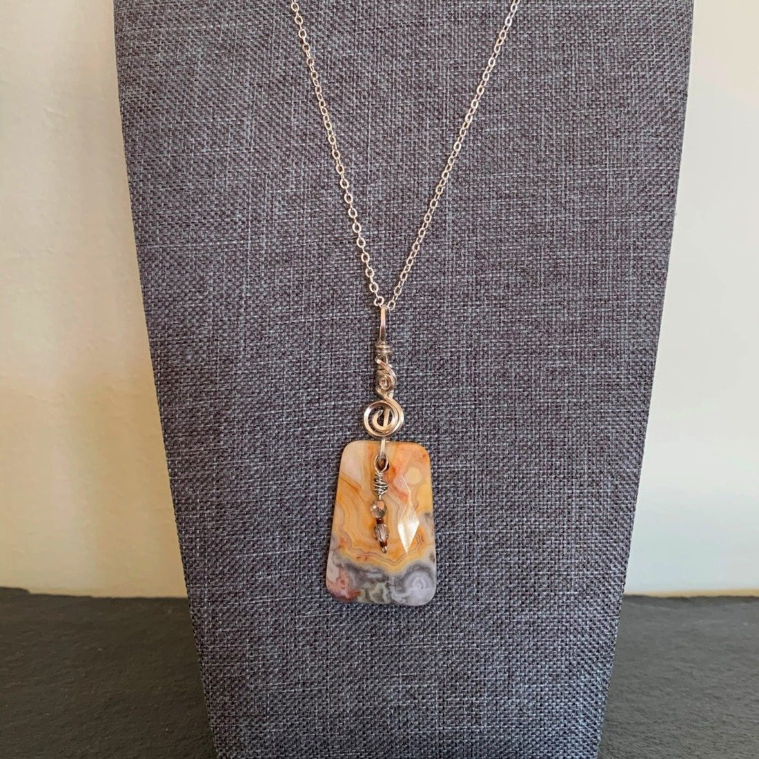 Pendant made of Picture Jasper, yellow & grey rectangle with silver wrap & crystal dangle; 1" w x 2.75" h, incl bail