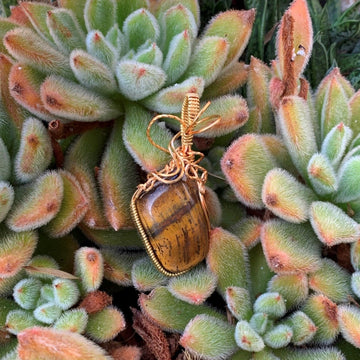 Pendant made of Large Tiger Eye Nugget with gold wrap; 1" w x 2.5" h, incl bail