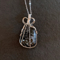 Pendant made of Large Indigo Gabbro stone with silver wrap; 1.25" w x 2.25" h, incl bail