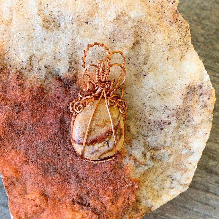 Pendant made of Yellow Jasper with copper wrap; 1" w x 2 1/8" h, incl bail