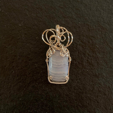 Pendant made of Blue Lace Agate Rectangle with Silver wrap; .75" w x 1 5/8" h incl bail