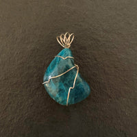 Pendant made of Blue Apatite Nugget with simple silver wrap; 1.5" w x 2.25" h, incl bail