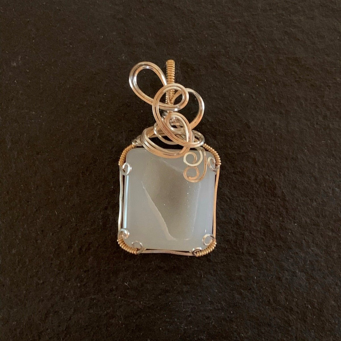 Pendant made of White Agate Druzy stone with silver & gold wrap; 1.25" w x 2.5" h, incl bail