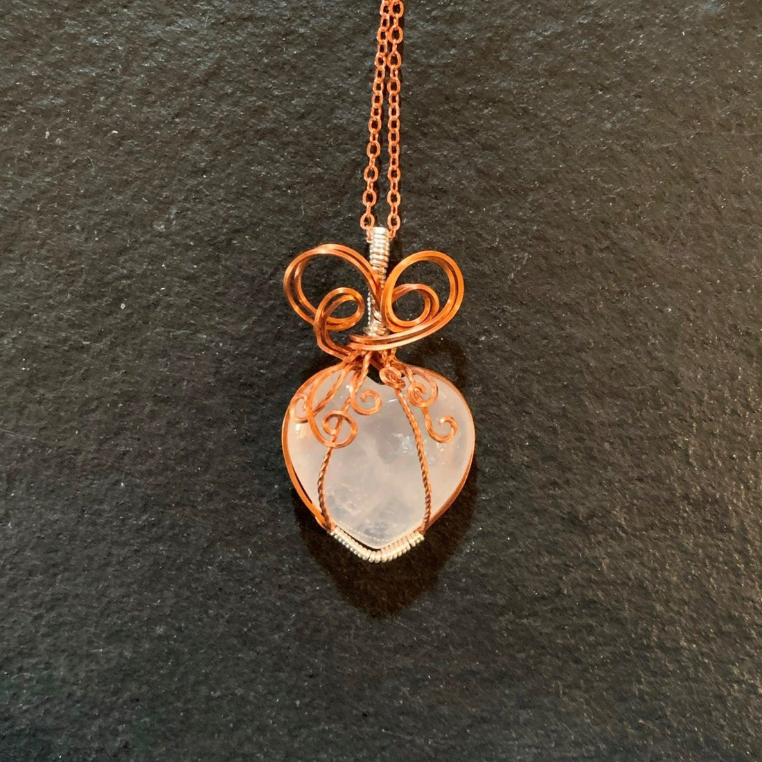 Pendant made of Rose Quartz Heart with copper & silver wrap; 1" w x 1 7/8" h, incl bail