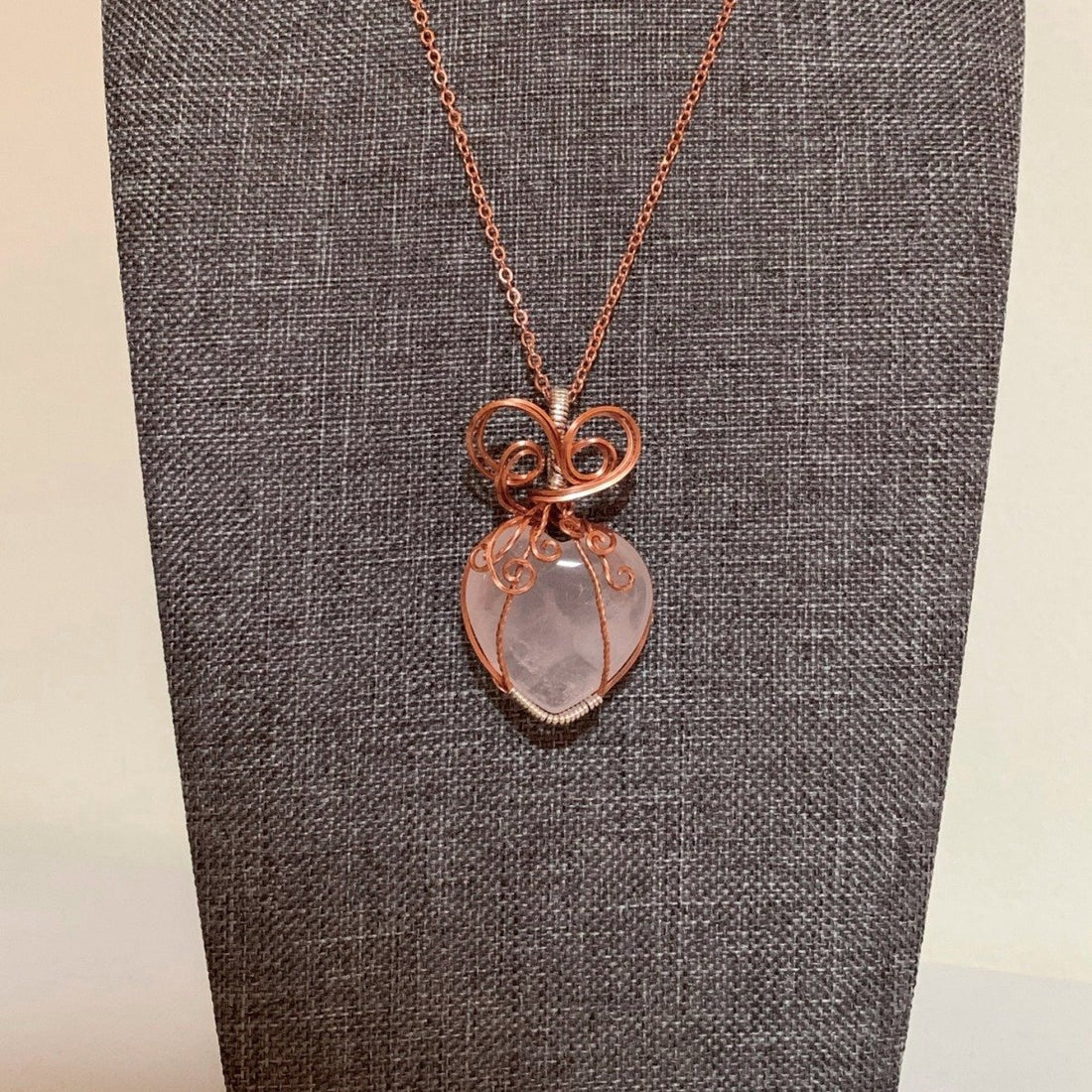 Pendant made of Rose Quartz Heart with copper & silver wrap; 1" w x 1 7/8" h, incl bail