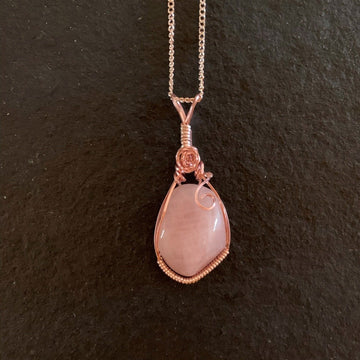 Pendant made of Rose Quartz Nugget with Rose Gold Wrap; 1" w x 2.25" h, incl bail