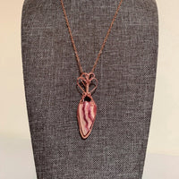 Pendant made of Rhodocrosite Pink striped teardrop with rose gold wrap; .75" w x 2 3/8" h, incl bail