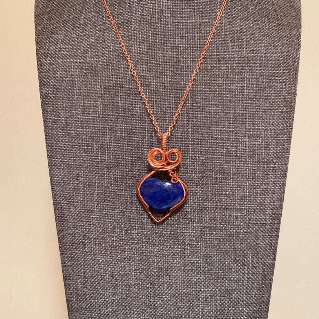 Pendant made of Lapis Lazuli Heart with Copper wire wrap; 1" w x 1.75" h, incl bail