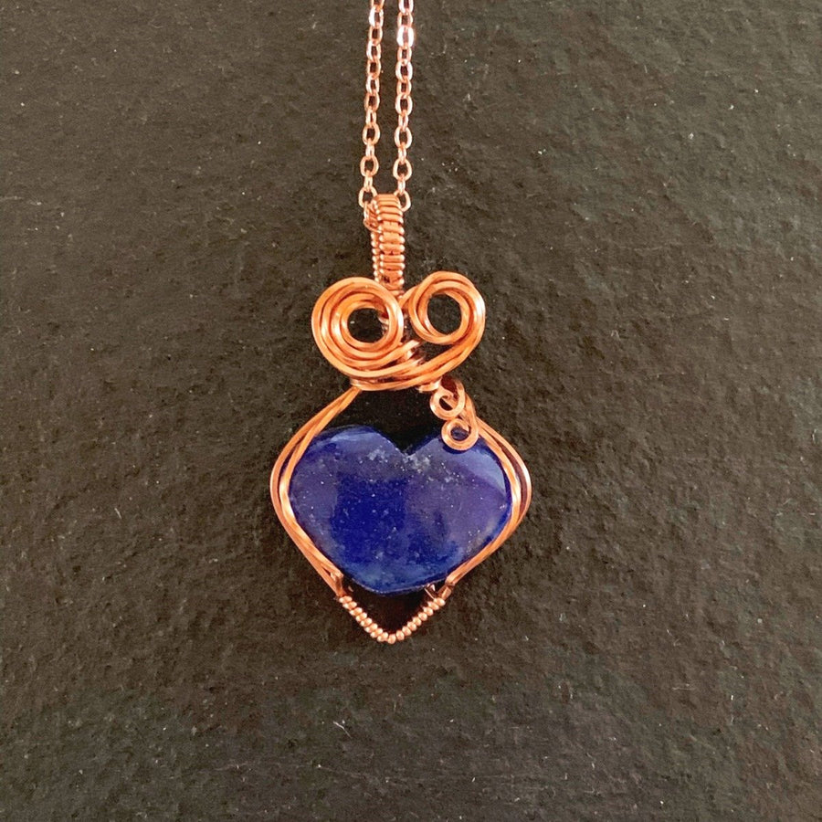 Pendant made of Lapis Lazuli Heart with Copper wire wrap; 1" w x 1.75" h, incl bail