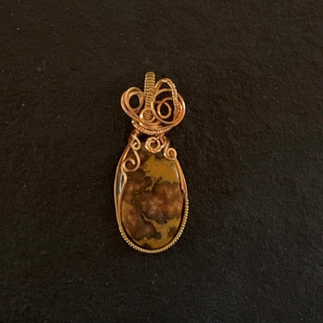 Pendant made of Large Gold & Brown Ocean Jasper Oval with gold wire wrap; 1" w x 2 3/8" h, incl bail