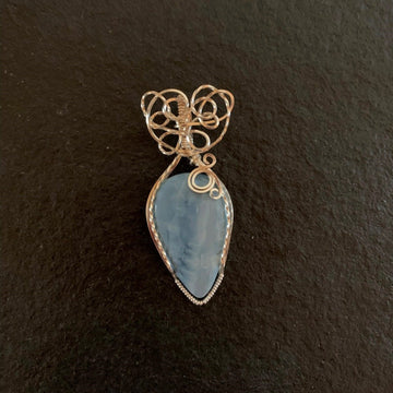 Pendant made of Blue Opal Teardrop with silver wire wrap; 1"w x 2 3/8" h, incl bail