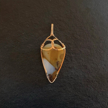 Pendant made of Large Polka Dot Jasper Teardrop stone with gold wire wrap; 1.25" w 3" long, incl bail