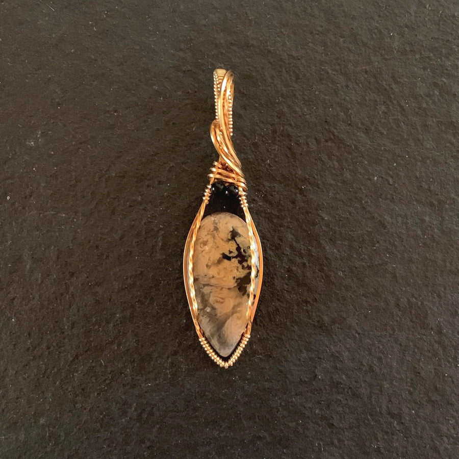 Pendant made of Tiger Dendritic Teardrop Quartz with gold wire wrap; 5/8" w x 2.50" long, incl bail