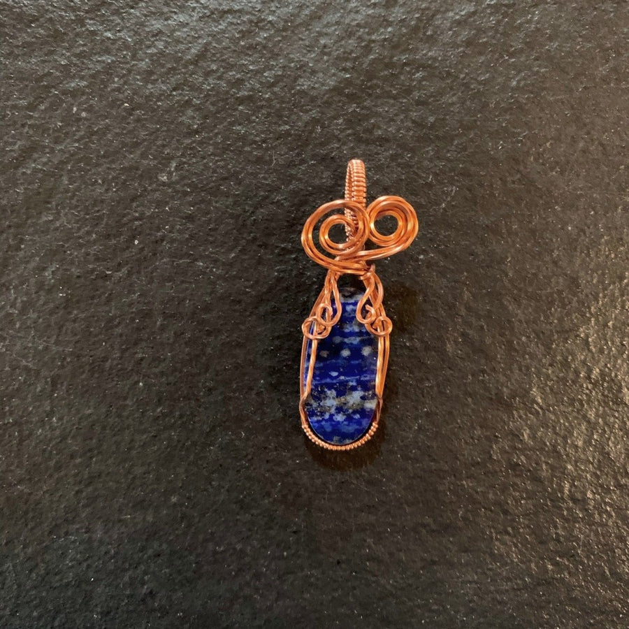 Pendant made of Lapis Lazuli Oval Pendant with copper wire wrap; 7/8" x 2 2 1/8" long, incl bail
