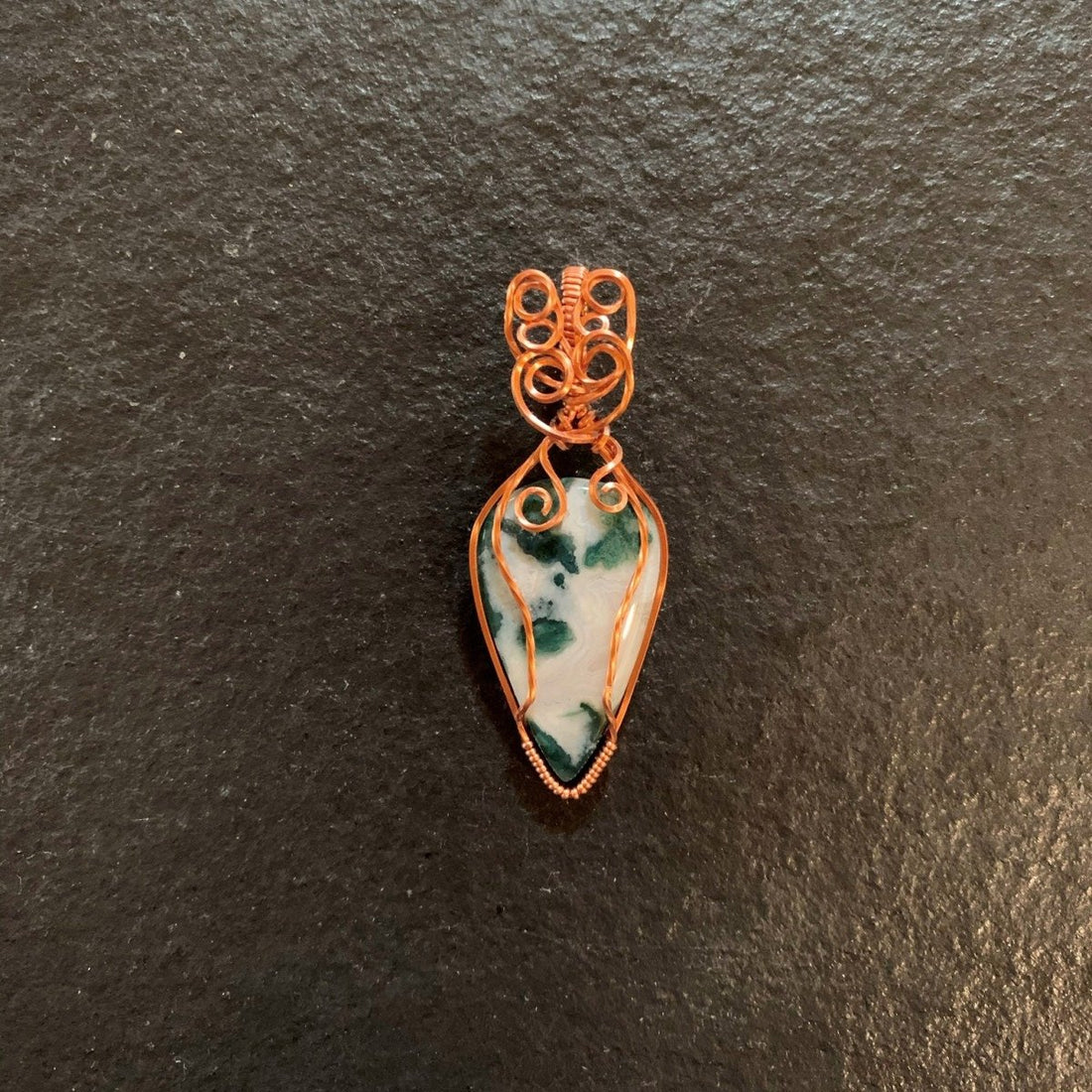Pendant made of Moss Agate Teardrop with copper wire wrap; 7/8" w x 2.25" long inc bail