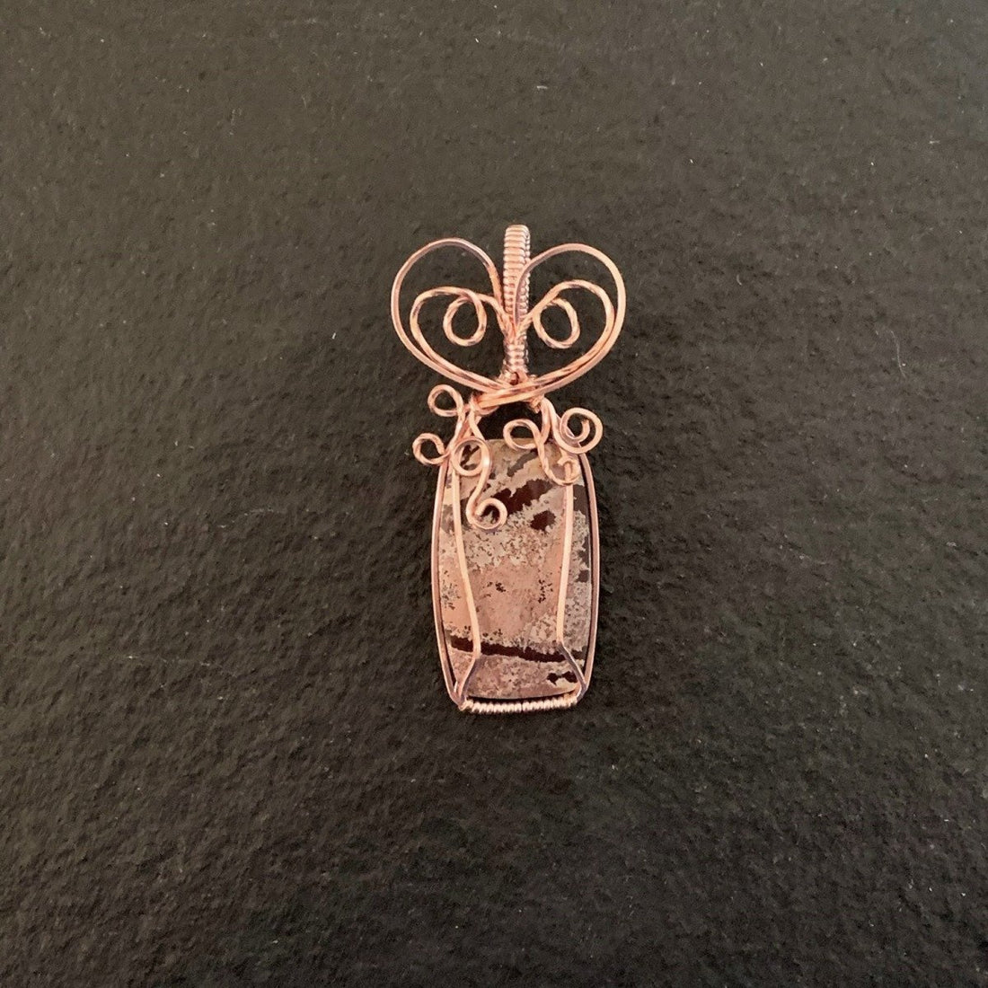 Pendant made of Sonoran Dendritic Jasper Rectangle with Rose Gold Wire wrap; 1" w x 2.25" long incl bail