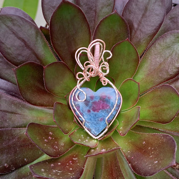 Ruby Kyanite Heart stone with silver & rose gold wire wrap; 1.25" w x 2.25" long incl bail