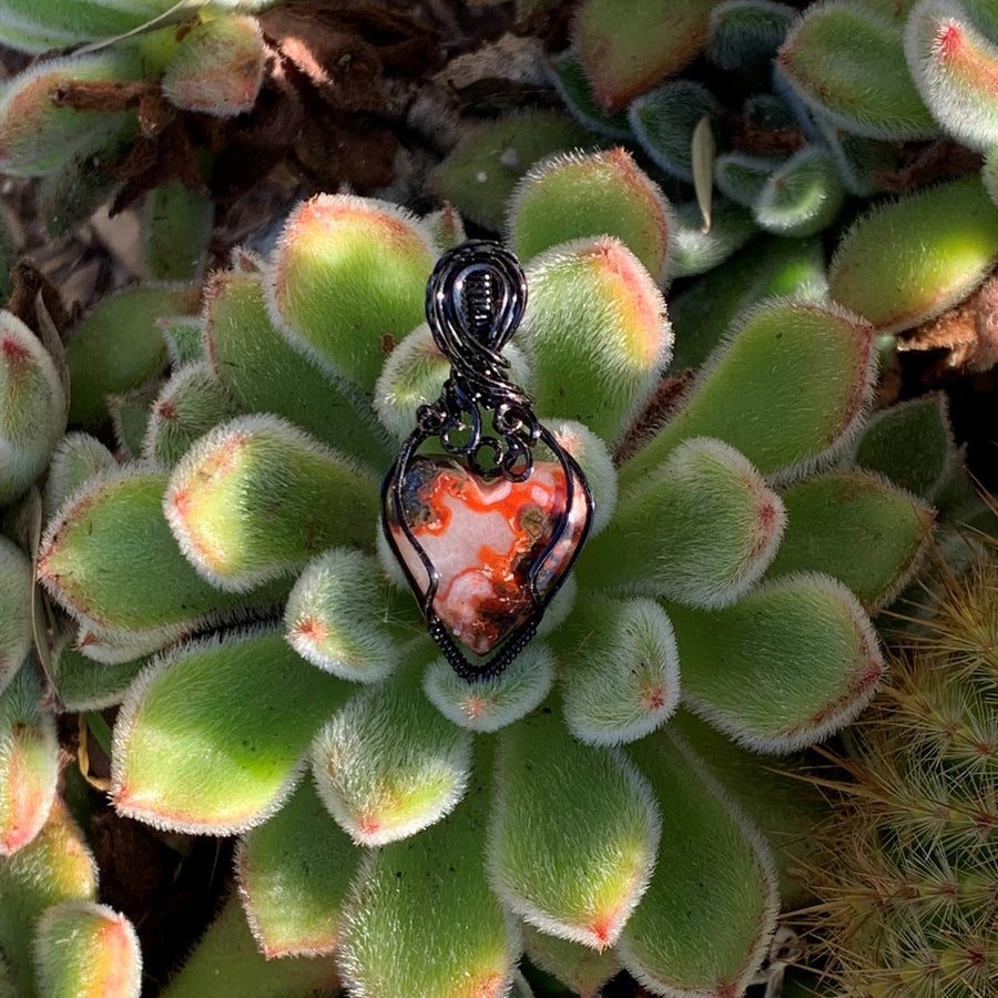 Moroccan Seam Agate Heart with Black Wire Wrap; 7/8" w x 1.75" long incl bail