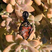 Moroccan Seam Agate Heart with Black Wire Wrap; 7/8" w x 1.75" long incl bail