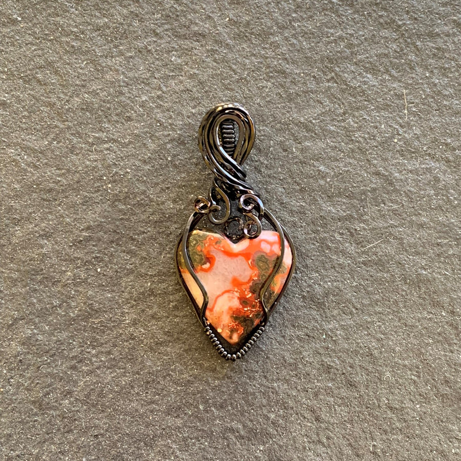 Moroccan Seam Agate Heart with Black Wire Wrap; 7/8" w x 1.75" long incl bail