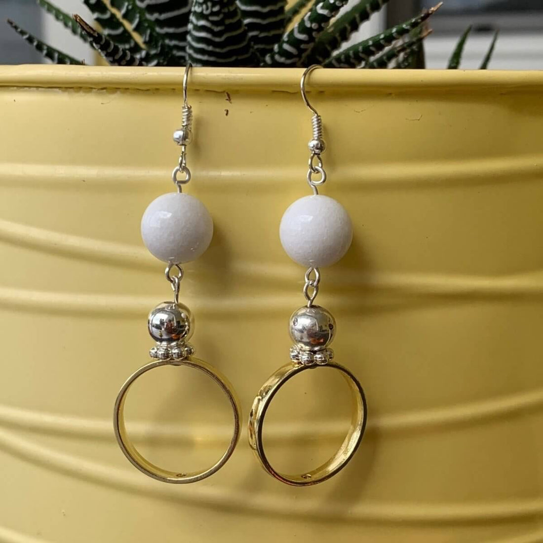 Earrings made of White Jade Rounds with gold & silver accents